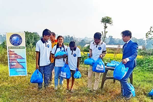 Silhouette of a hand reaching out in a black and white contrast.